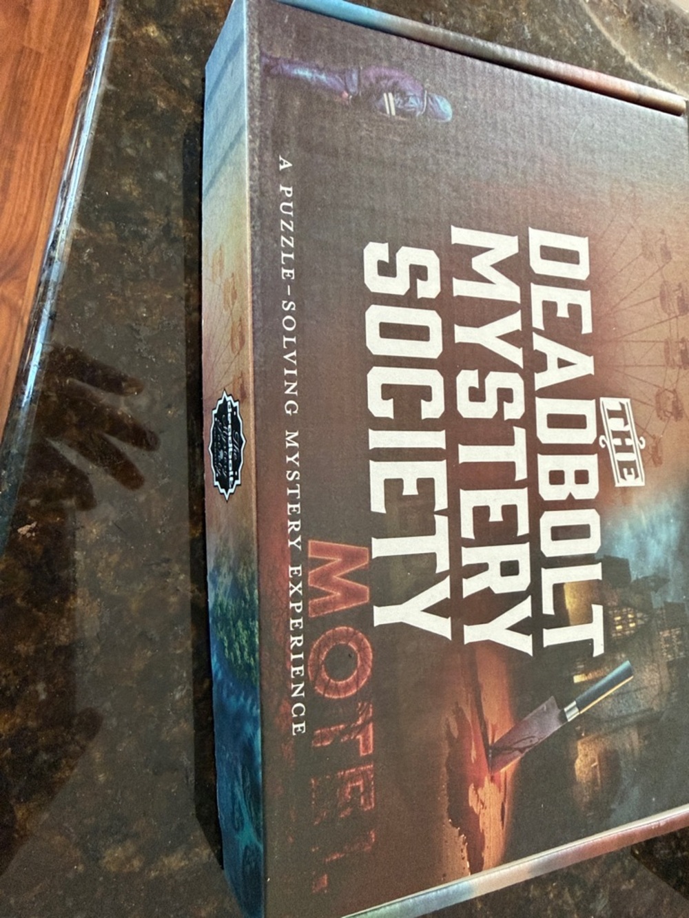 The Deadbolt Mystery Society Motel Box - Brown & Blue Puzzle Game